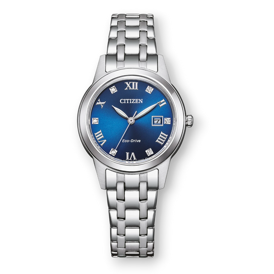 Bendixen-Braun Citizen women's solar watch with blue dial, Roman numerals, date window, and Swarovski crystals.
