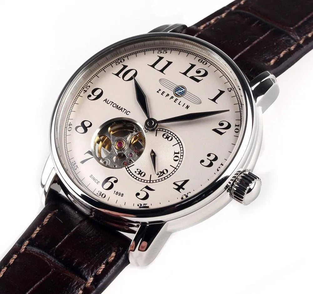 Edle Zeppelin Automatik Armbanduhr mit open heart und braunem Lederarmband. Hochwertige Herrenuhr für stilbewusste Träger bei Bendixen-Braun.