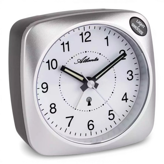 Bendixen-Braun Atlanta silver analog alarm clock with white face, Arabic numerals, and snooze/light button.