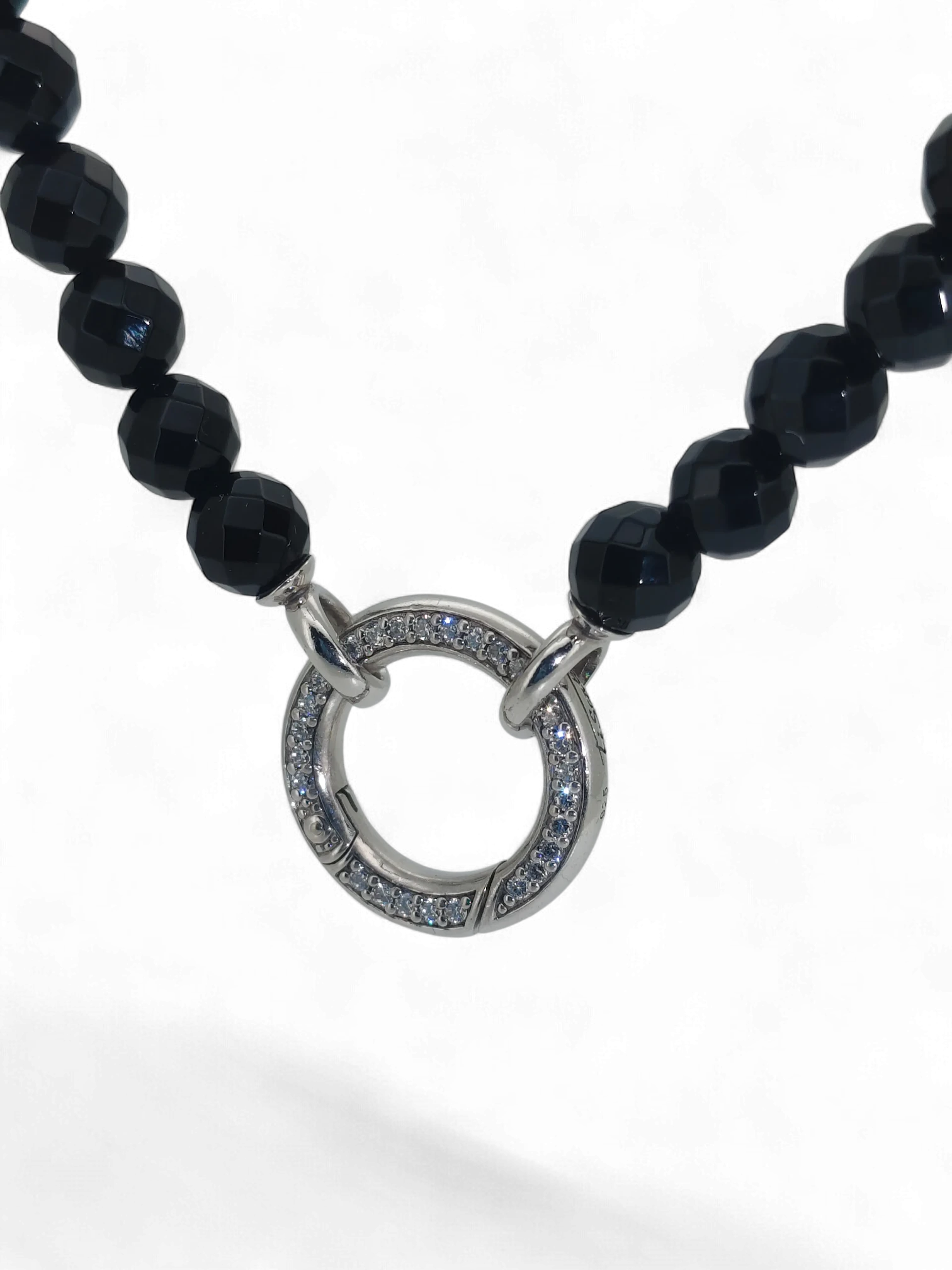 Bendixen-Braun necklace with faceted black glass beads and a silver clasp with cubic zirconia.