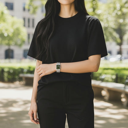 Bendixen-Braun rectangular women's watch with a matte-finish titanium bracelet and a grey dial with silver indices.