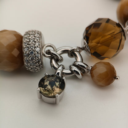 Bendixen-Braun rhodium-plated silver bracelet with brown glass stones and a polished heart pendant with zirconia.