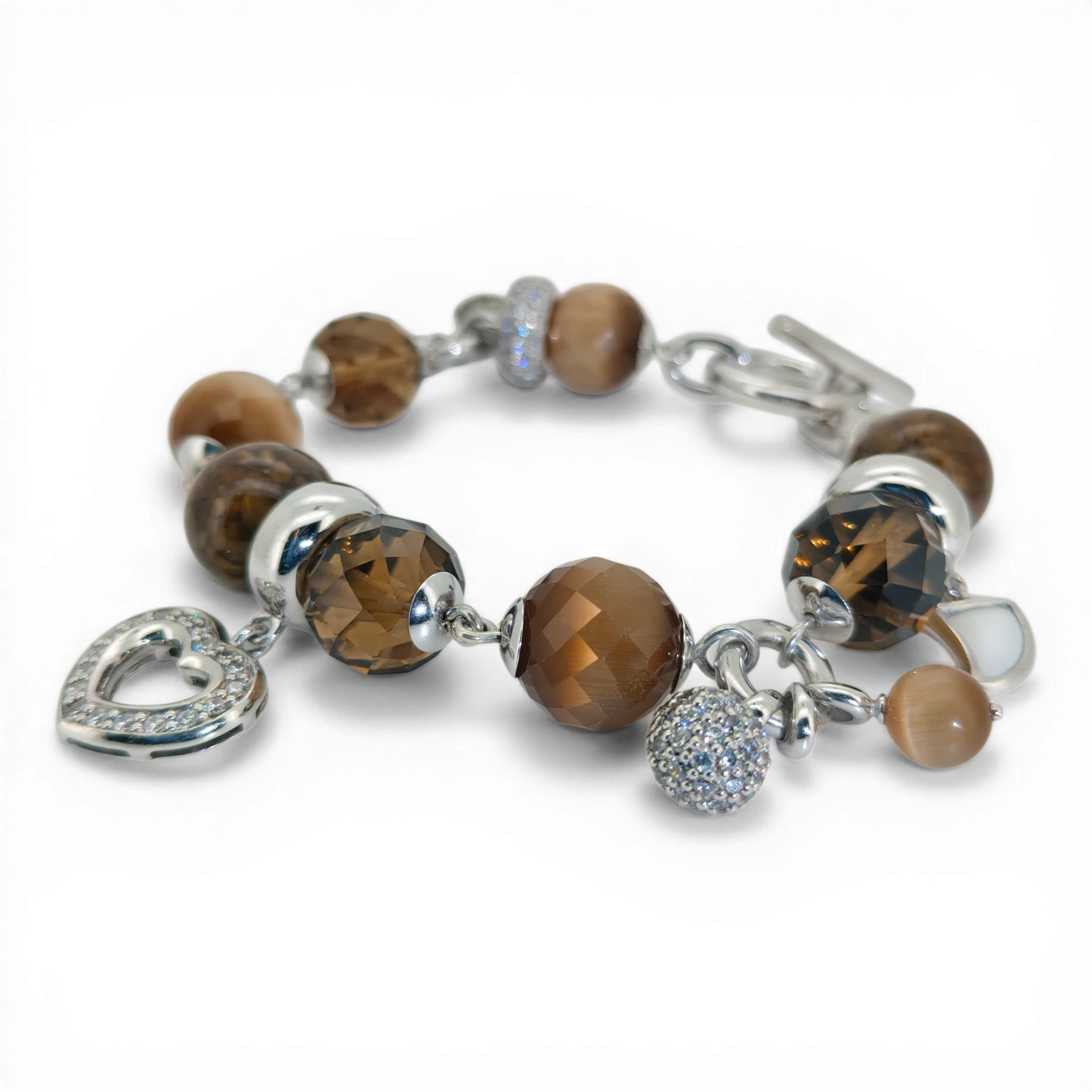 Bendixen-Braun rhodium-plated silver bracelet with brown glass stones, faceted zirconia, and a polished heart charm.