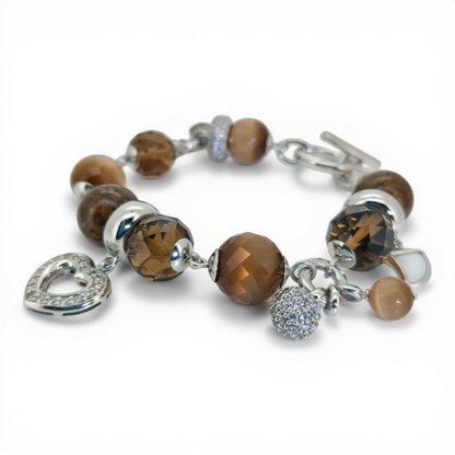 Bendixen-Braun rhodium-plated silver bracelet with brown glass stones, faceted zirconia, and a polished heart charm.