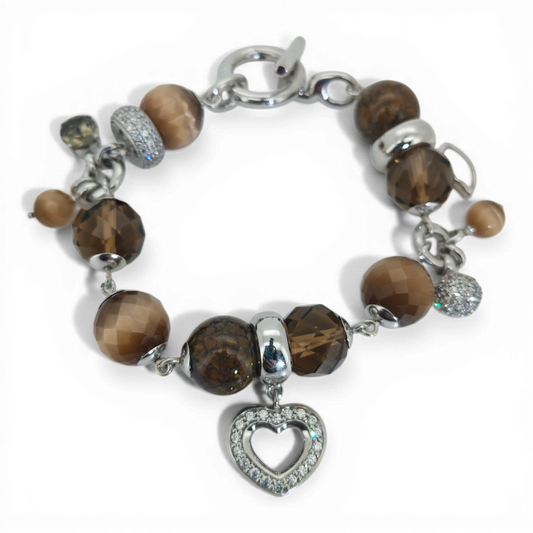 Bendixen-Braun rhodium-plated silver charm bracelet with brown glass beads, faceted zirconia, and a heart pendant.