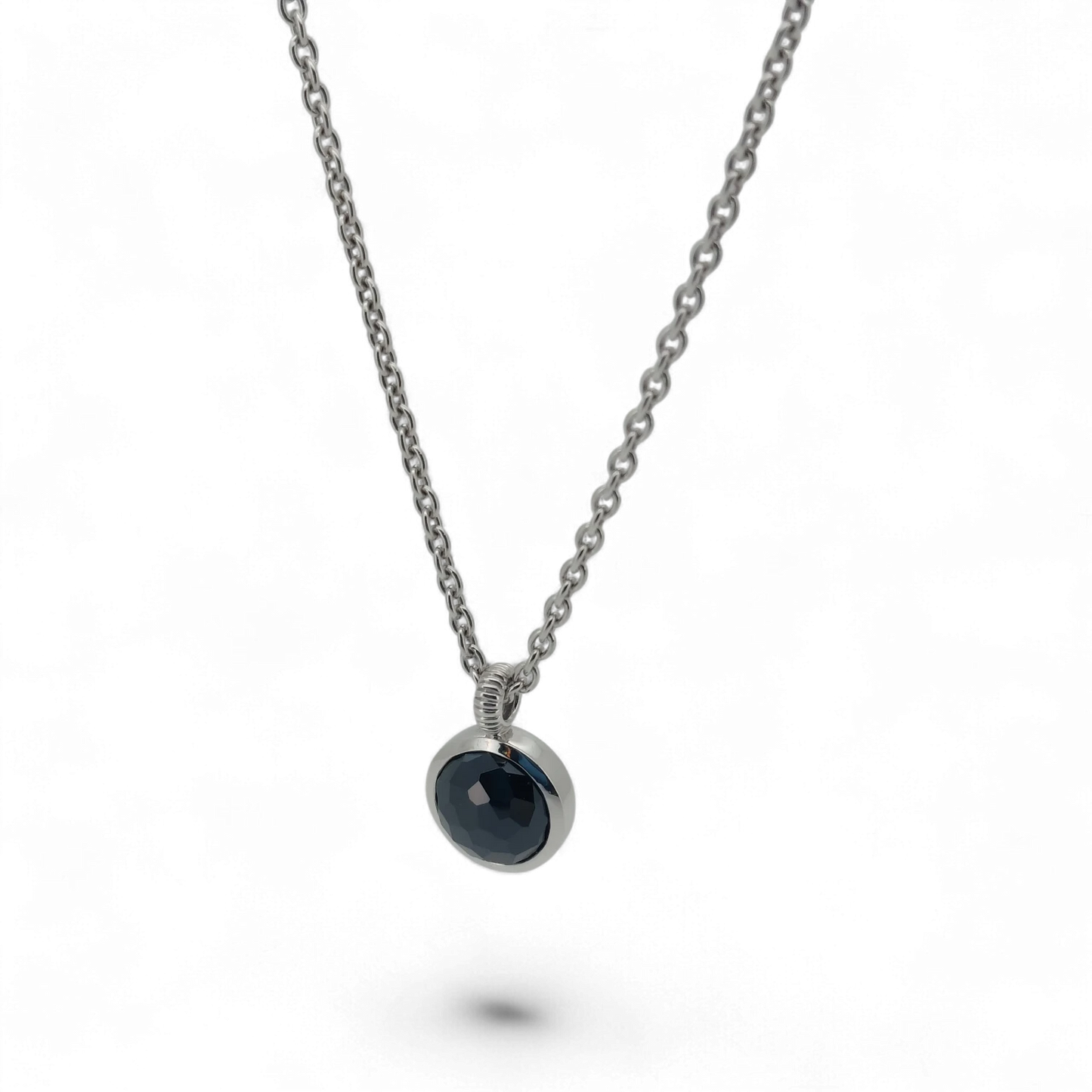 Bendixen-Braun silver necklace with rhodium finish and round faceted black stone pendant.