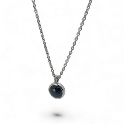 Bendixen-Braun silver necklace with rhodium finish and round faceted black stone pendant.