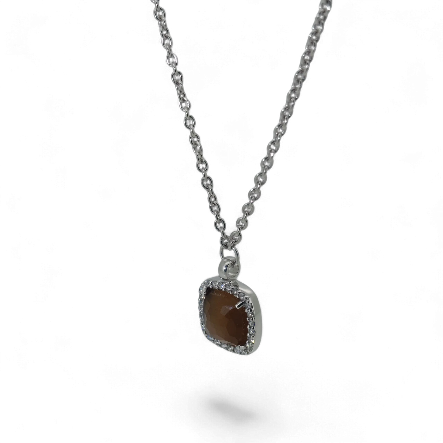 Bendixen-Braun rhodium-plated silver necklace with brown faceted glass pendant surrounded by cubic zirconia.