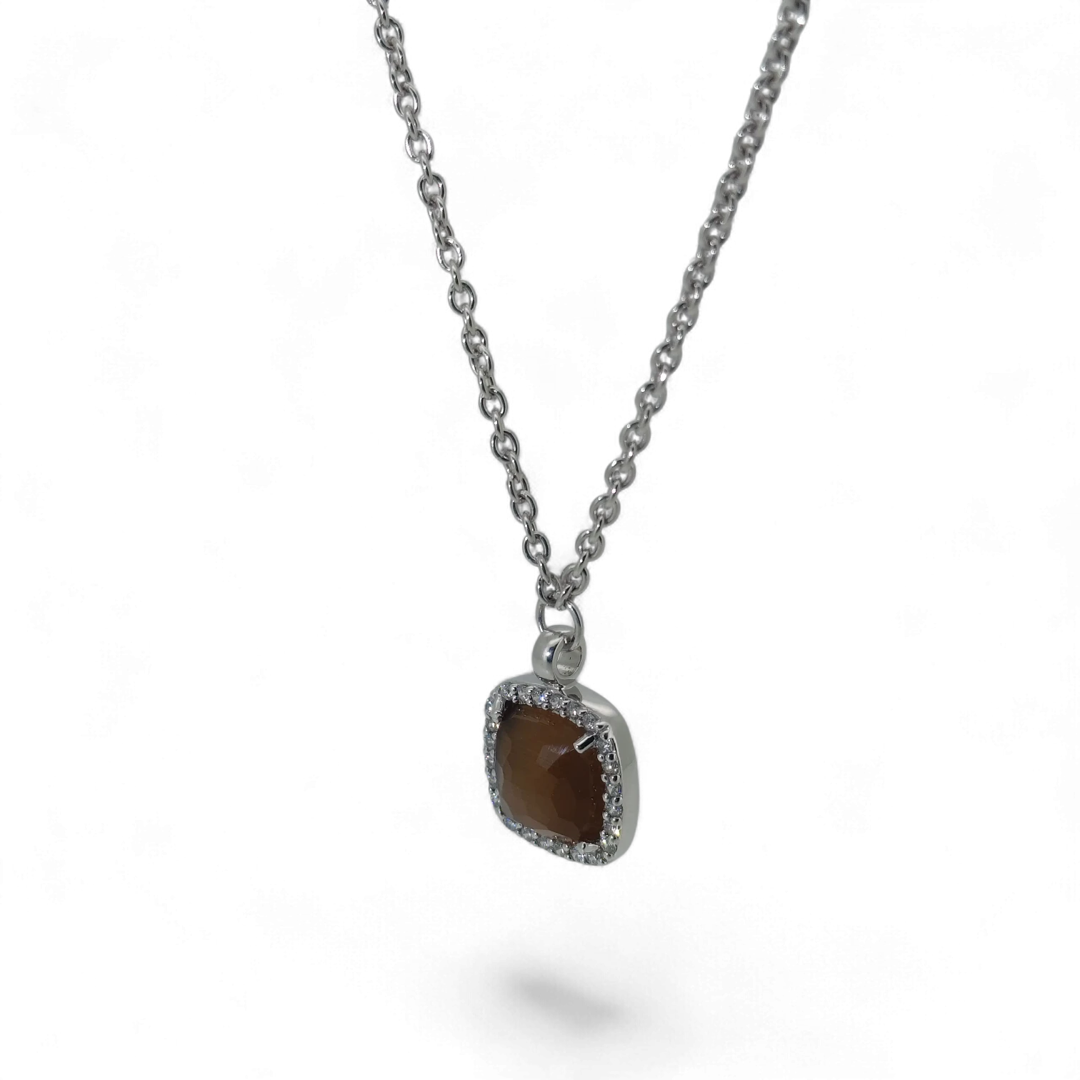 Bendixen-Braun rhodium-plated silver necklace with brown faceted glass pendant surrounded by cubic zirconia.