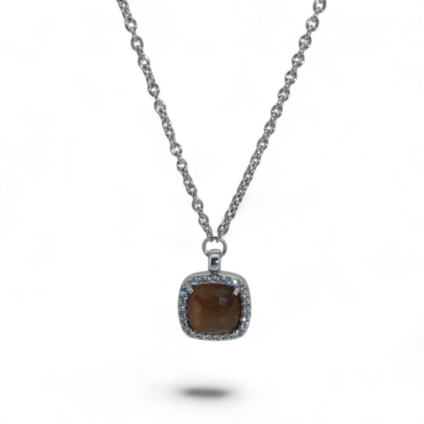 Bendixen-Braun rhodium-plated silver chain with brown faceted glass pendant surrounded by cubic zirconia.