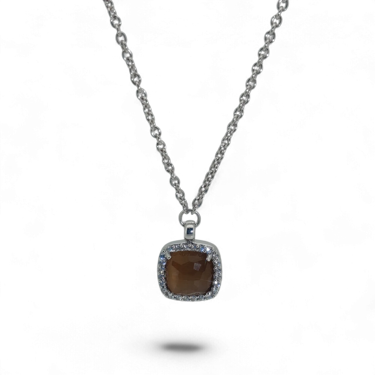 Bendixen-Braun rhodium-plated silver chain with brown faceted glass pendant surrounded by cubic zirconia.