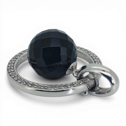 Bendixen-Braun rhodium-plated silver pendant with black glass ball and cubic zirconia accents.